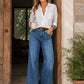 High-Waist Wide-Leg Jeans with Button Detail