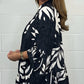 V-Neck Floral Flared Sleeve Ruffle Hem Top