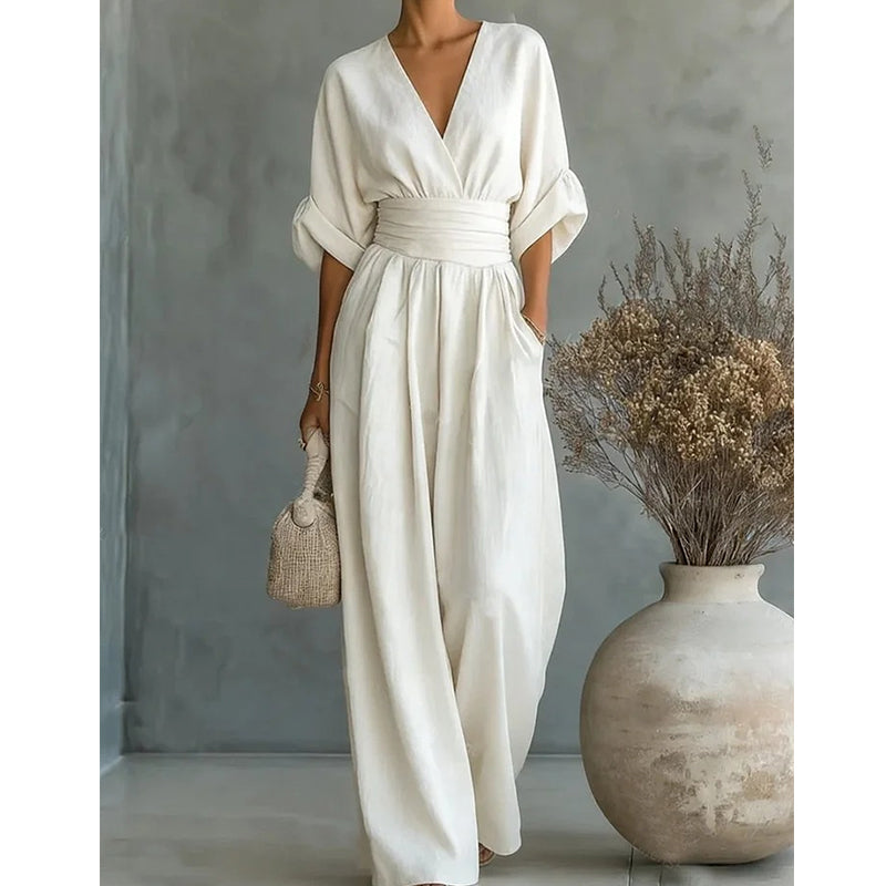 👗 60% OFF NOW! ✨ Elegant V-Neck Wide-Leg Jumpsuit – Flattering Waist Sash, Soft Breathable Fabric & Relaxed Fit 🦋